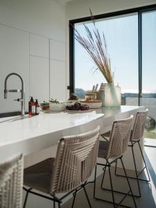 Villa Royale, moderna villa con piscina y vistas al mar