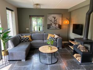 Bosboerderij de Goudsberg met hottub in tuin