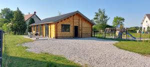 Chalets chalet de la voie verte en plein coeur du Jura : photos des chambres