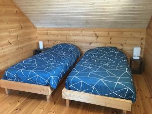 Chalets Charmante maison en bois proche mer : photos des chambres