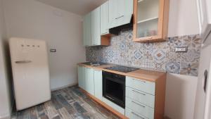 NAUTILUS - monolocale seminterrato con finestre