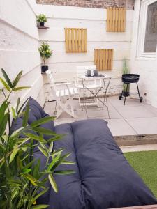 Appartements Le Chat d'Or - Terrasse Cosy - BBQ - WIFI HD : photos des chambres