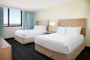 Two Queen Room with Bay/Sunset View room in Embassy Suites by Hilton Tampa Airport Westshore