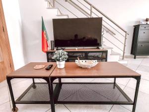 Peniche master bedroom with sea view balcony, private bathroom, shared kitchen, swimming pool, surfing resort