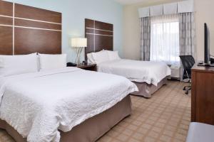 Queen Room with Two Queen Beds (4 Adults) room in Hampton Inn and Suites Hutto