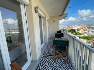 Appartements GROOMI Le Petit George- T3, clim, terrasse et front de mer ! : photos des chambres