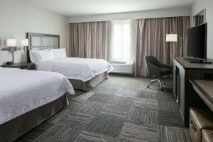 Queen Room with Two Queen Beds - Mobility and Hearing Access/Non-Smoking room in Hampton Inn & Suites-Hudson Wisconsin