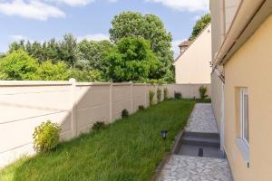 Maisons de vacances Maison Ecouen : photos des chambres