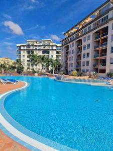 Homely Apt in Modern building with Pool