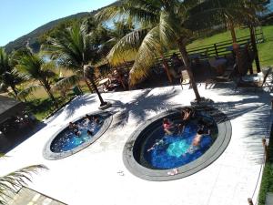 Aldeia do Lago C405-churrasqueira, bebidas liberadas no parque aquático, internet no ap, rampa de acesso ao lago, recarga carro elétrico, pesqueiro