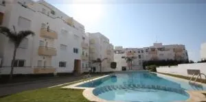 Appartement avec piscines, vue sur mer et accès à la plage à Achakar Hill, Tanger. - Mediouna