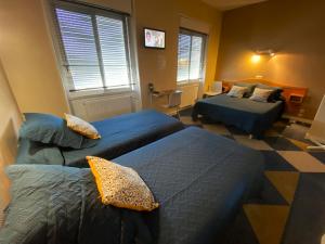 Hotels Hotel le Pasteur : Chambre Familiale - Vue sur Jardin