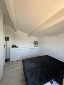 Appartements Appartement Duplex Climatise Le Trident : photos des chambres