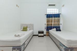 Urbanview Hotel Syariah 99 Banjarbaru by RedDoorz