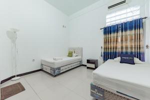 Urbanview Hotel Syariah 99 Banjarbaru by RedDoorz