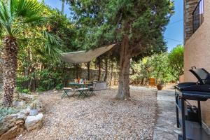 Appartements Gracious AC one bedroom with garden and pool - Dodo et Tartine : Appartement