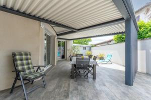 Maisons de vacances La Maison Blanquefort - Maison avec jardin et terrasse : photos des chambres