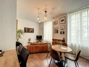 Appartements Le Vintage - 15 min FUTUROSCOPE : photos des chambres