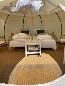Mellem-rummet Guesthouse & Glamping