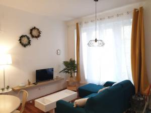 Appartements Cosy Paradise - 2ch -parking prive - Chateau : photos des chambres