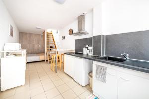 Appartements Les Prairies - Studio en plein centre de Calais : photos des chambres