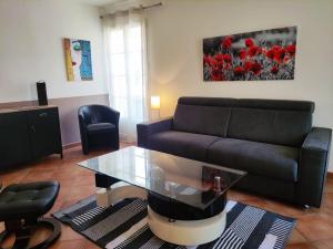 Appartements Appartement, plein centre, balcons, clim, parking : photos des chambres