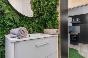 Appartements L’Eden, appartement privatif avec balneo : photos des chambres