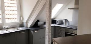 Appartements Duplex au centre avec parking - L'etoile : photos des chambres