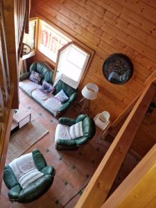 Chalets Ravissant chalet en madrier : photos des chambres