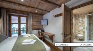 B&B / Chambres d'hotes Chalet K120 - Village du Praz - Courchevel : photos des chambres