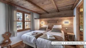 B&B / Chambres d'hotes Chalet K120 - Village du Praz - Courchevel : Chambre Double ou Lits Jumeaux Deluxe - Vue sur Montagne