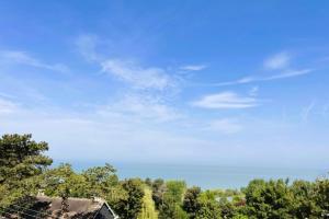 Appartements Aux Flots Bleus avec balcon et vue sur mer : photos des chambres