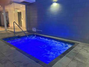 City apartment, pool & carpark