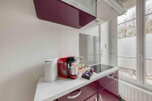 Appartements Jacuzzi exterieur a 15 min de Paris* : photos des chambres