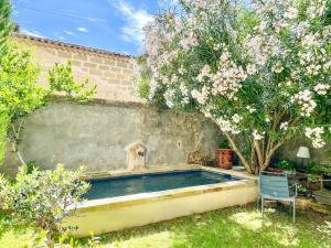 Villas Bien d'exception, clim, jardin, bassin, coeur Uzes : photos des chambres