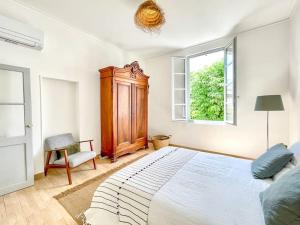 Villas Bien d'exception, clim, jardin, bassin, coeur Uzes : photos des chambres