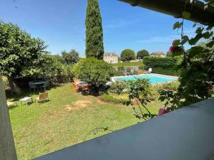 Appartements Studio with AC, pool & garden, 2km St Emilion : photos des chambres