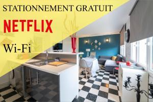 Appartements SPACIEUX APPARTEMENT A PROXIMITE DU CENTRE VILLES WIFI STATIONNEMENT GRATUIT : photos des chambres