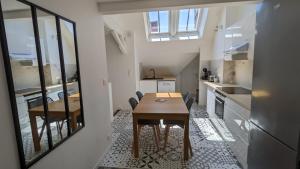 3 Appartements Premium au pied de la Cathedrale - Hypercentre : photos des chambres