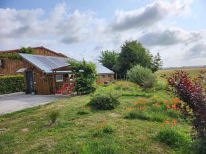 Maisons de vacances le chalet de la ferme du tertre : photos des chambres