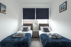 Deluxe 2 bed, 2 bathroom Milton Keynes apartment within walking distance to train station and City centre.