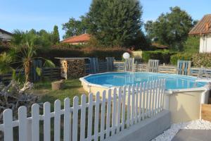 Maisons de vacances Maison familiale avec piscine hors sol : photos des chambres