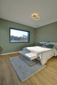 Villas Villa haut de gamme dans un parc de verdure : photos des chambres