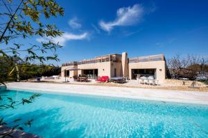 Villas Belle villa contemporaine de 300m2 avec piscine : photos des chambres