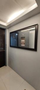 Lax Uno 2 bedroom home with Parking, Wi-Fi, NetFlix and Airconditioned Rooms and Shower Heater