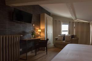 Hotels Art'Hotel & SPA Le Potin Gourmand : photos des chambres