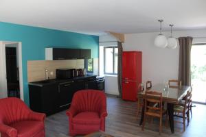 Appartements Au Lavoir du Beal, piscine : photos des chambres