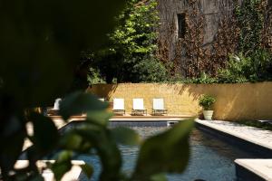 Appartements Au Lavoir du Beal, piscine : photos des chambres