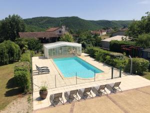 Maisons de vacances Maison charmante a Saint-Gery avec piscine partagee : photos des chambres