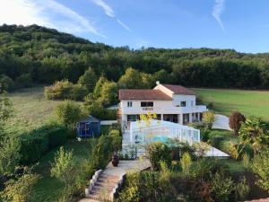Maisons de vacances Maison charmante a Saint-Gery avec piscine partagee : photos des chambres